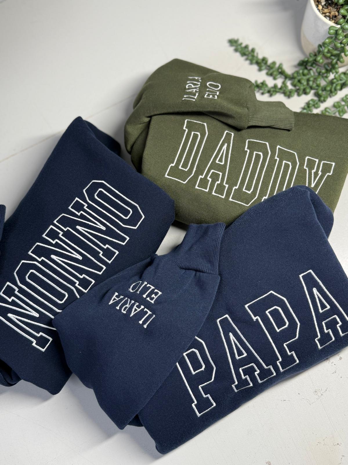 Custom hoodies in various colours with embroidered designs